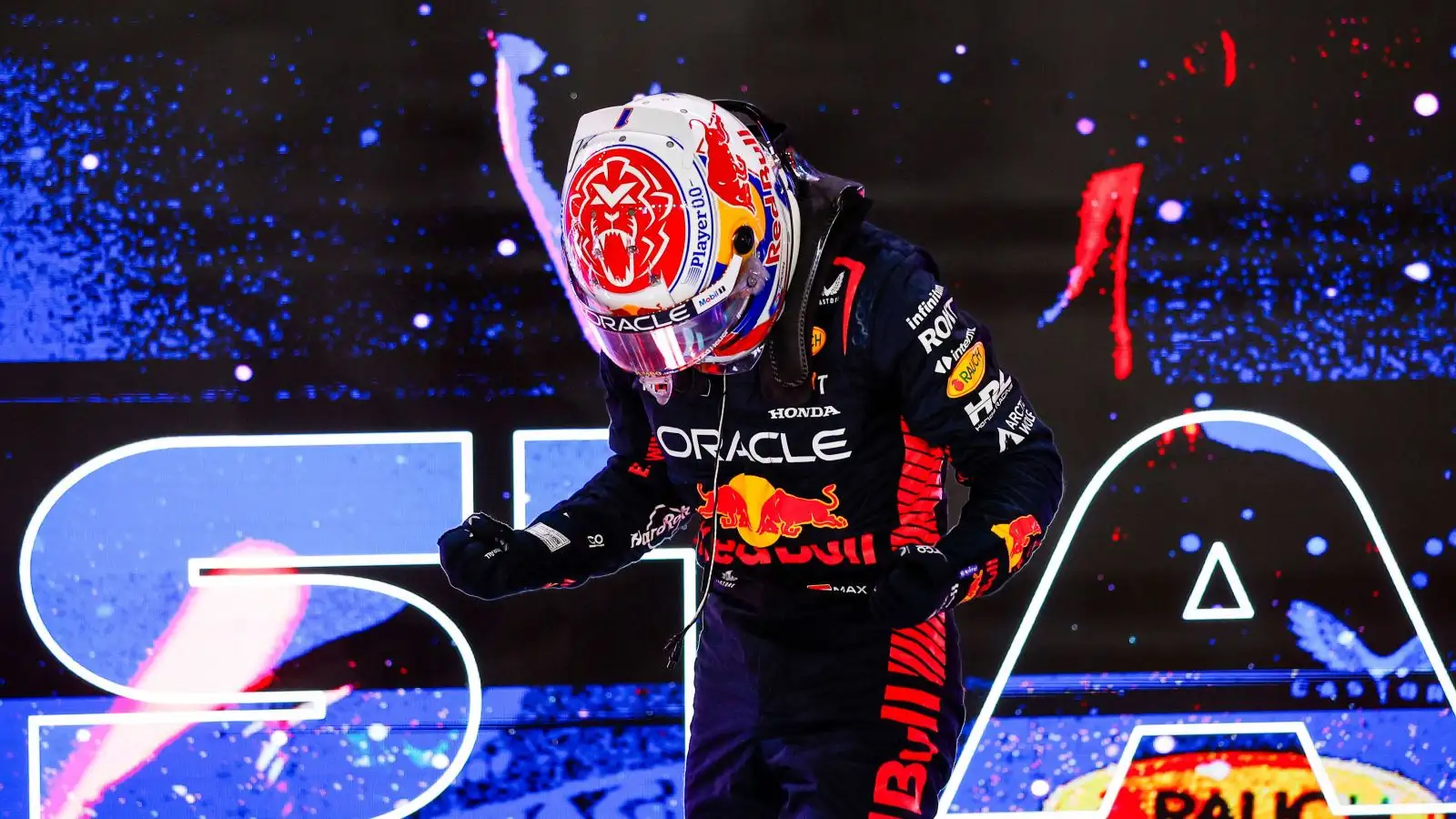 Red Bull driver Max Verstappen celebrates after clinching his third F1 title in the Qatar sprint race.