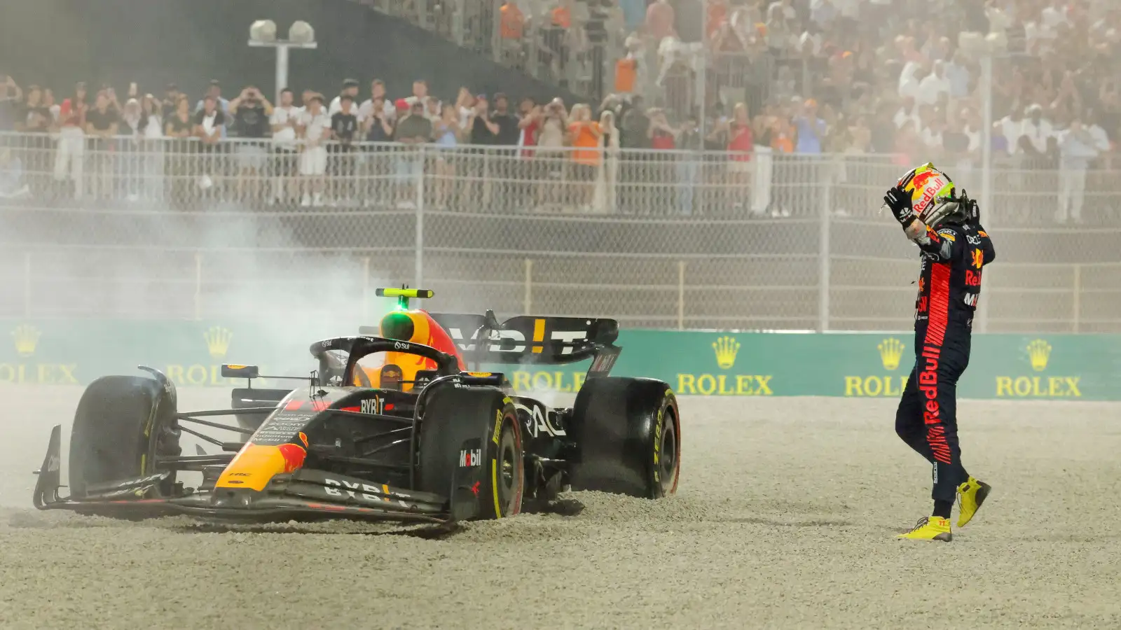 Red Bull driver Sergio Perez hands in the air after Qatar sprint crash.