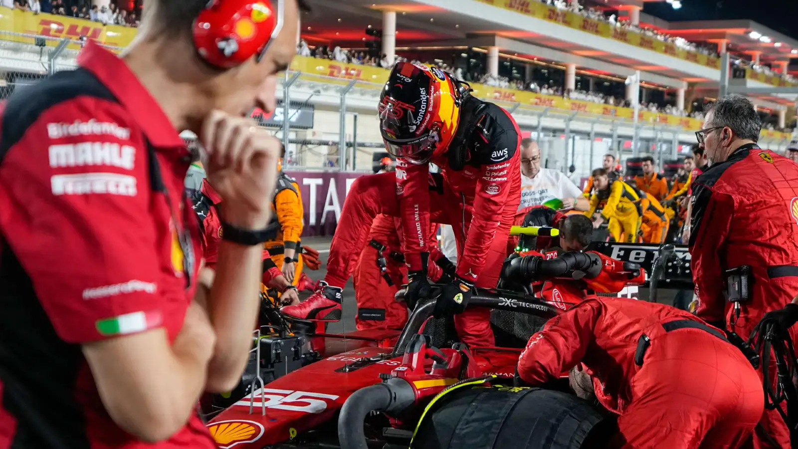 Ferrari's Carlos Sainz climbs out of his car at the Qatar Grand Prix.