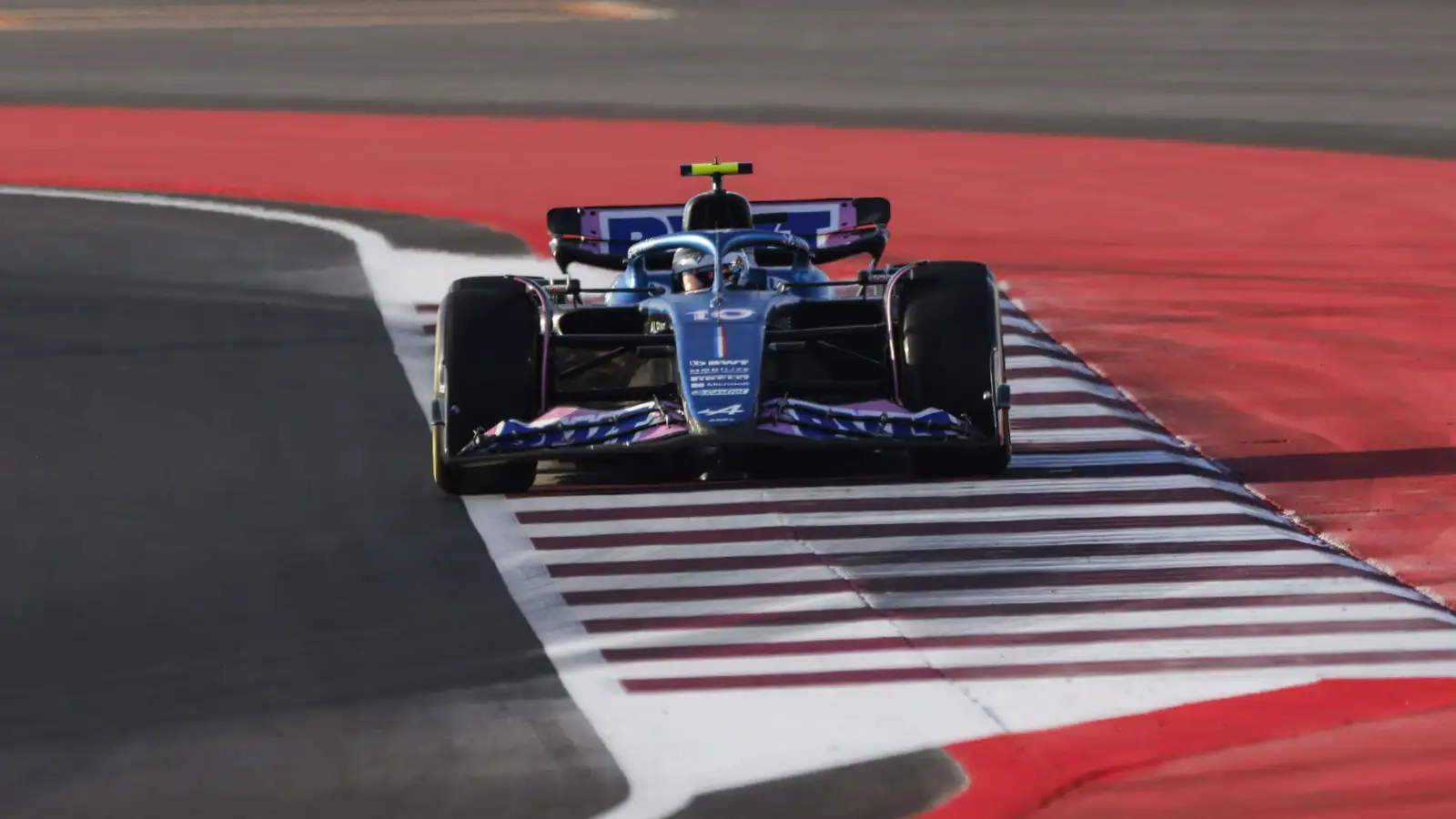 Alpine driver Pierre Gasly running wide on the revised track limits at Lusail.