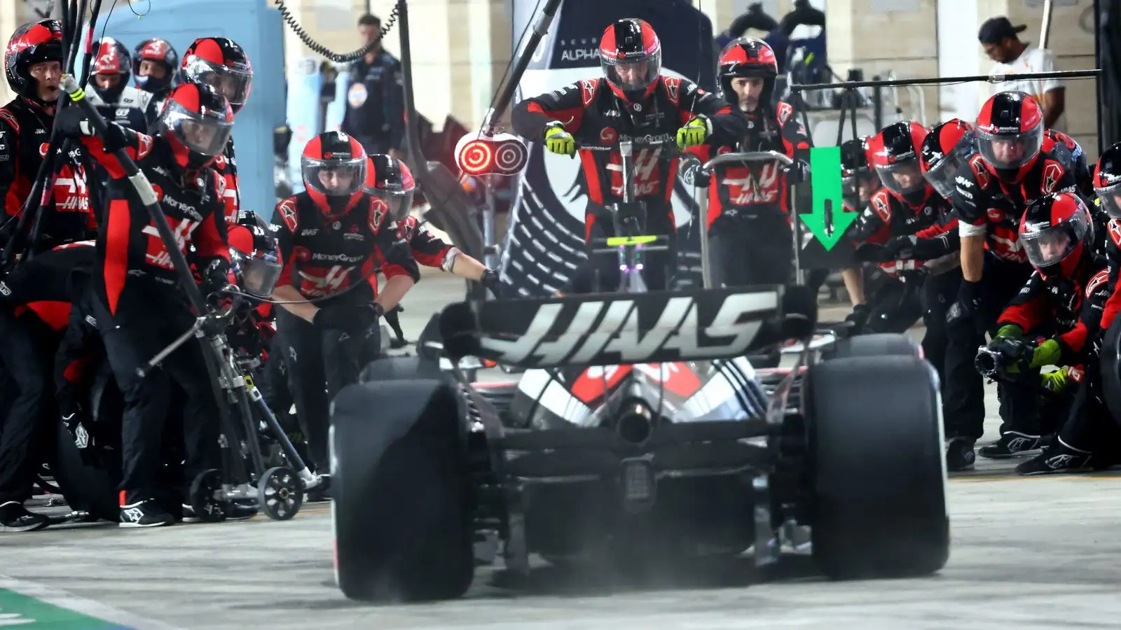 Haas driver Nico Hulkenberg pulls into the pits for a pit stop.