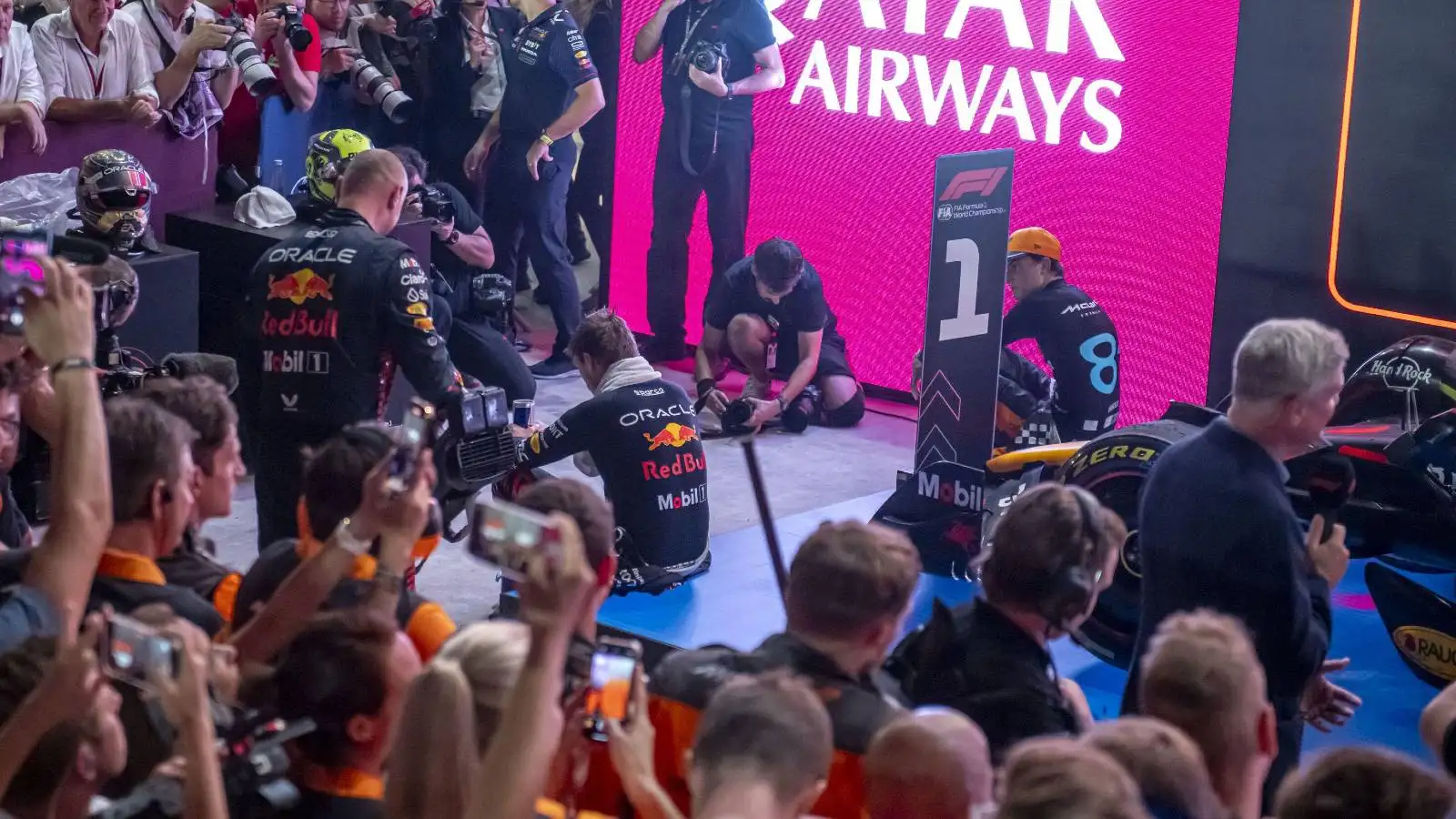 Max Verstappen, Red Bull and Oscar Piastri, McLaren, sit down after a gruelling Qatar Grand Prix.