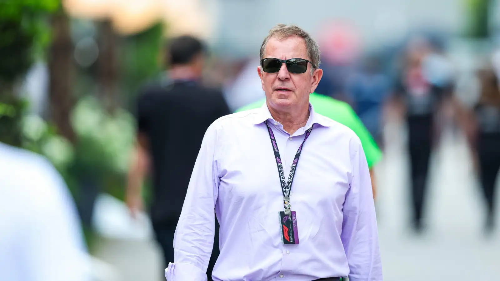 Sky F1 broadcaster Martin Brundle walks through the paddock at the Singapore Grand Prix.