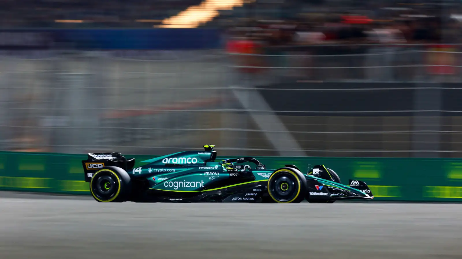 作为ton Martin's Fernando Alonso racing during the Qatar Grand Prix.