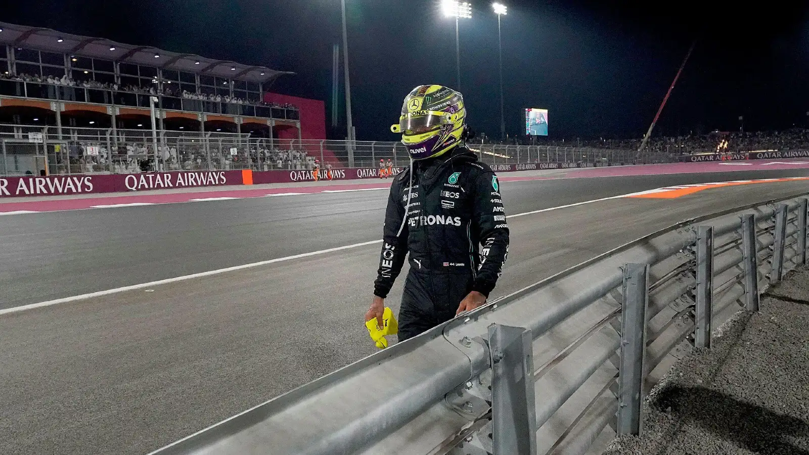 Mercedes' Lewis Hamilton walks back to the pits at the Qatar Grand Prix.