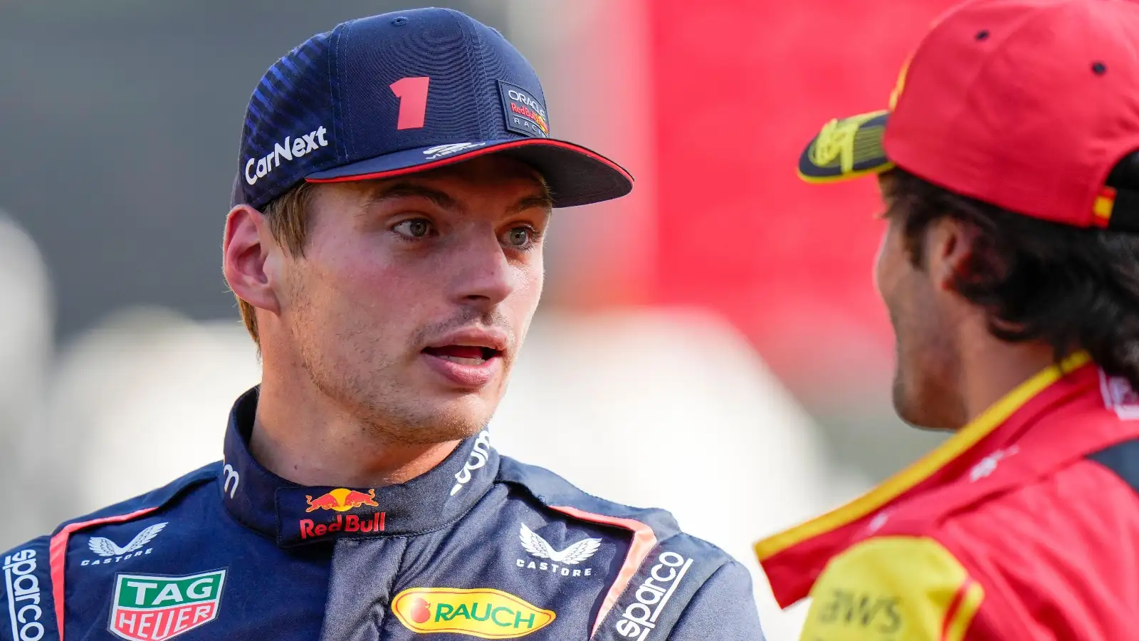 Max Verstappen speaks to Carlos Sainz.