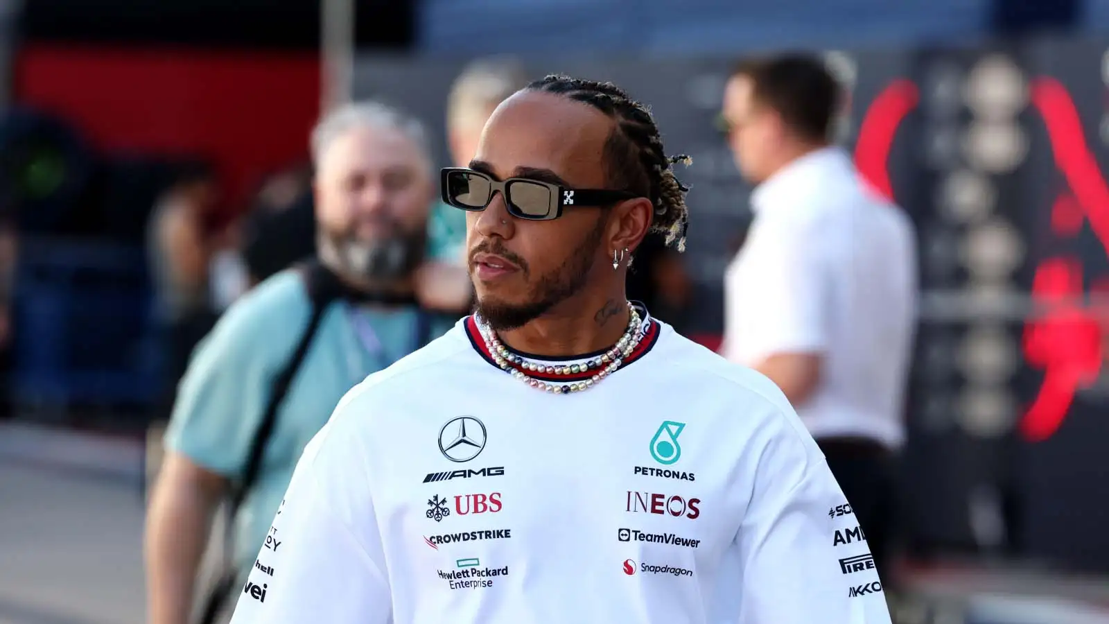 Lewis Hamilton arrives in the paddock at COTA.
