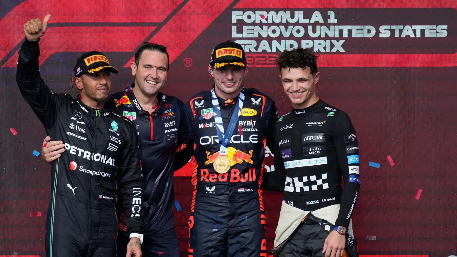 Lewis Hamilton, Max Verstappen and Lando Norris on the US Grand Prix podium.