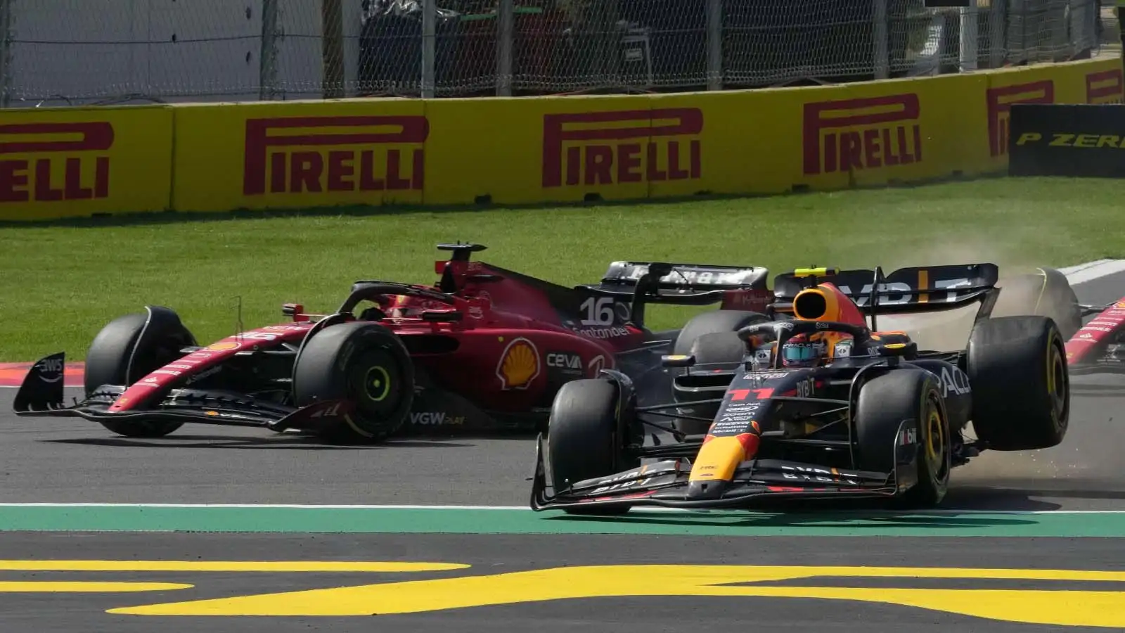 Sergio Perez slides off track after contact with Charles Leclerc.