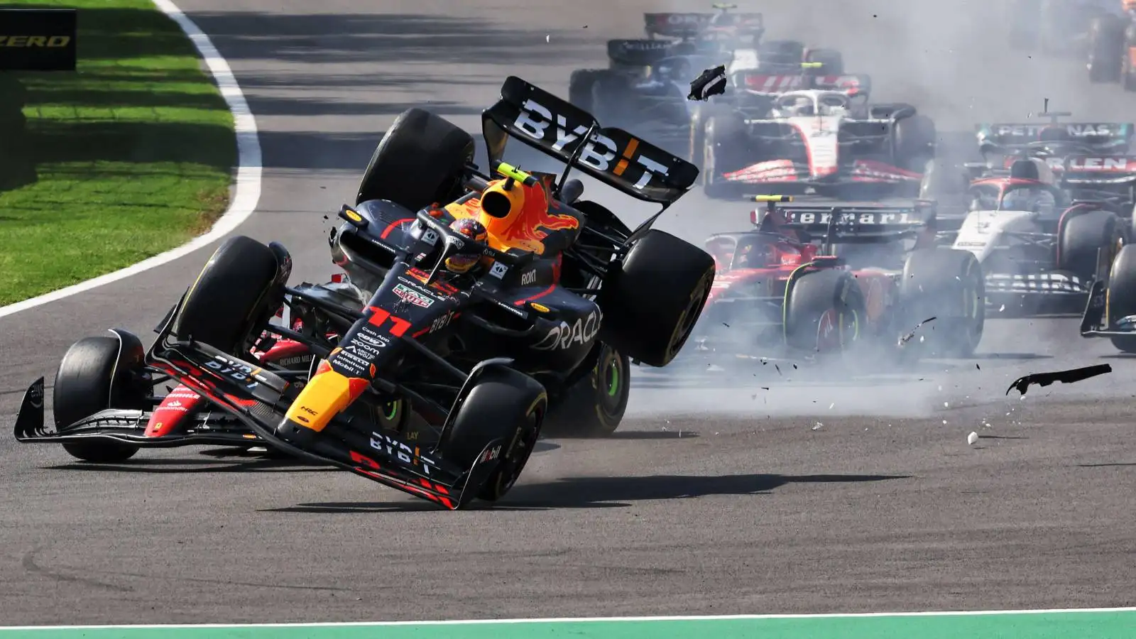 Sergio Perez collides with Charles Leclerc at the Mexican GP start.
