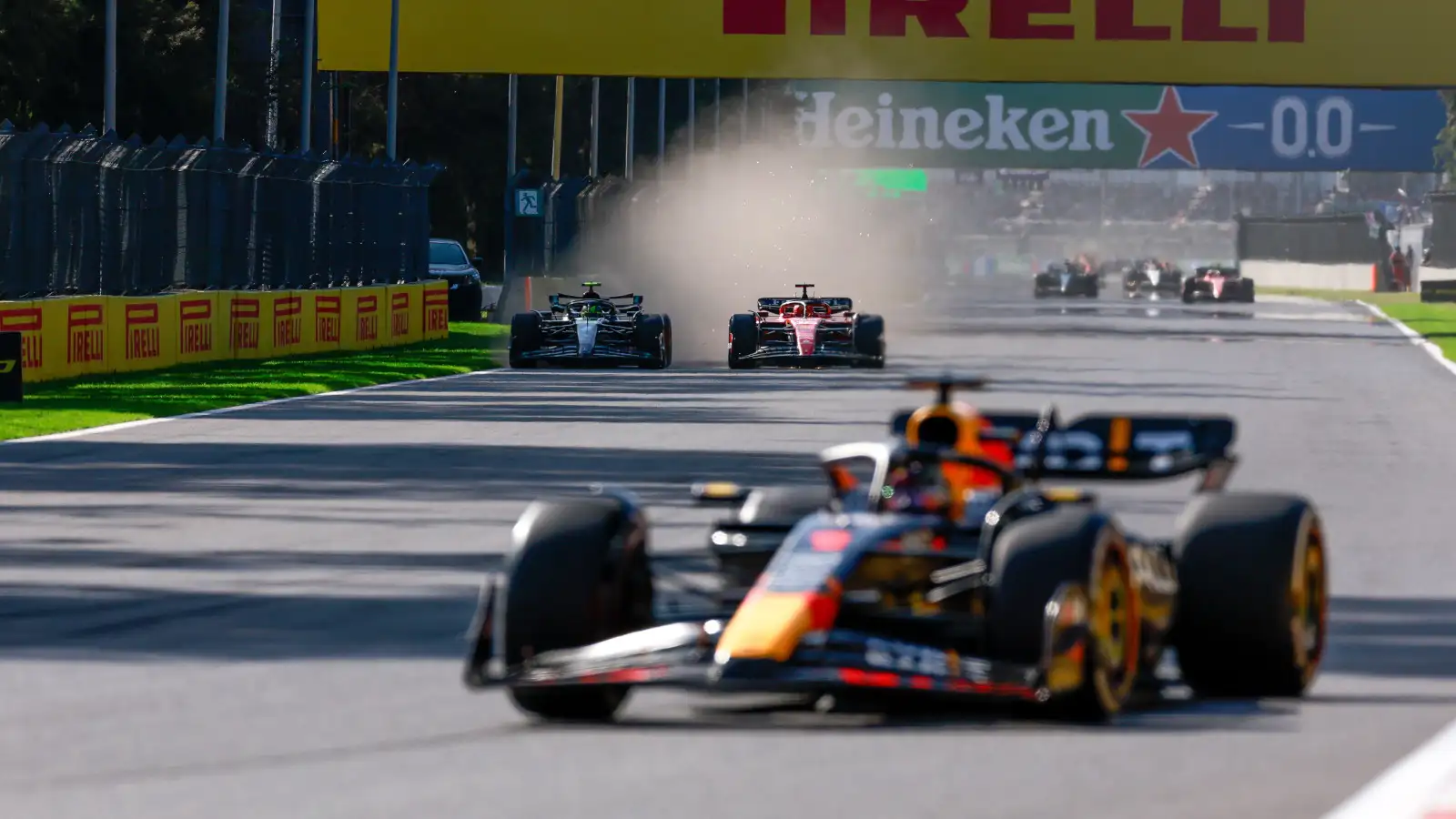 Red Bull driver Max Verstappen leads ahead of Charles Leclerc and Lewis Hamilton.