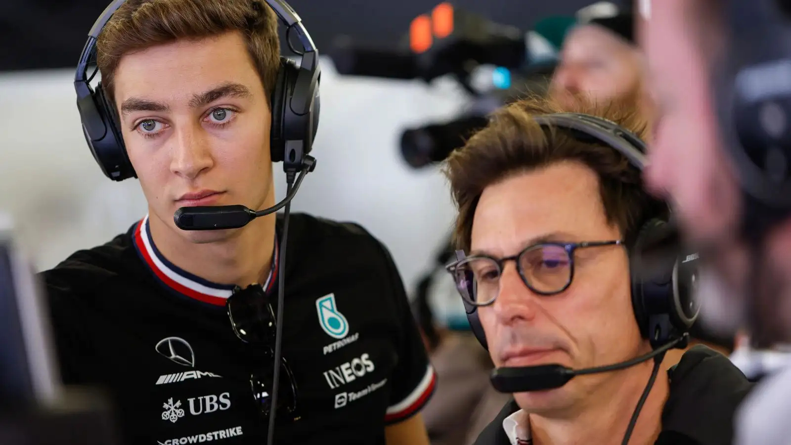 Mercedes driver George Russell on the mic with Toto Wolff.