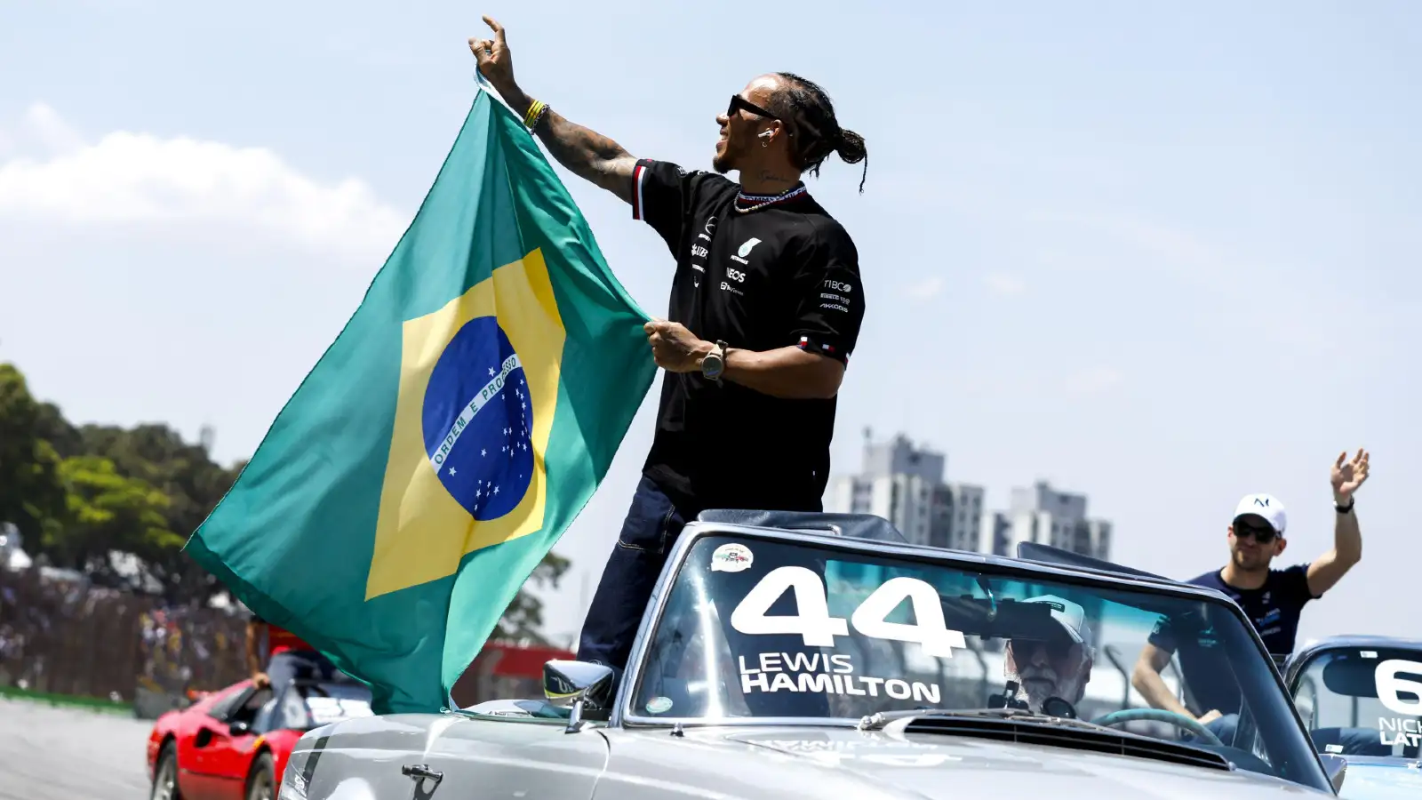 Lewis Hamilton pictured with a Brazilian flag during the 2022 race in Sao Paolo.