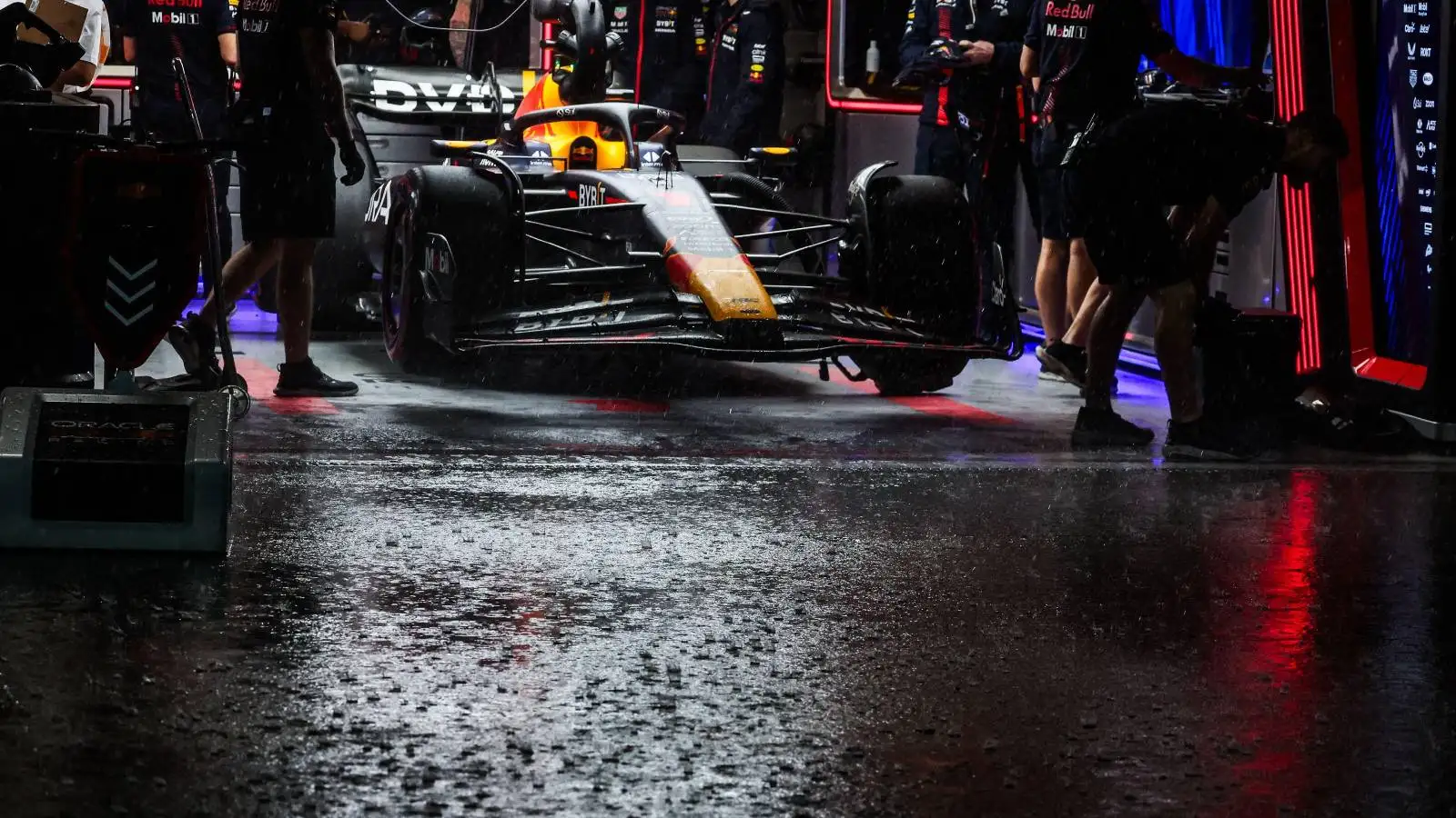 Heavy rain falling outside the Red Bull garage at Interlagos.