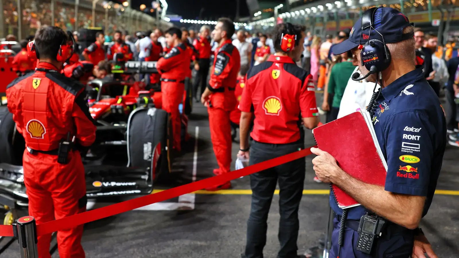 Adrian Newey looks at the Ferrari.