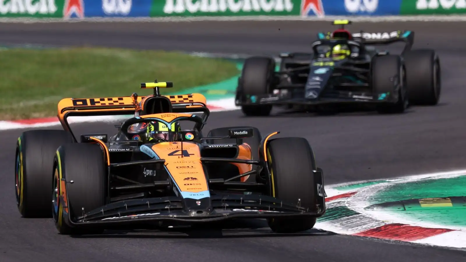 McLaren's Lando Norris leads Lewis Hamilton of Mercedes