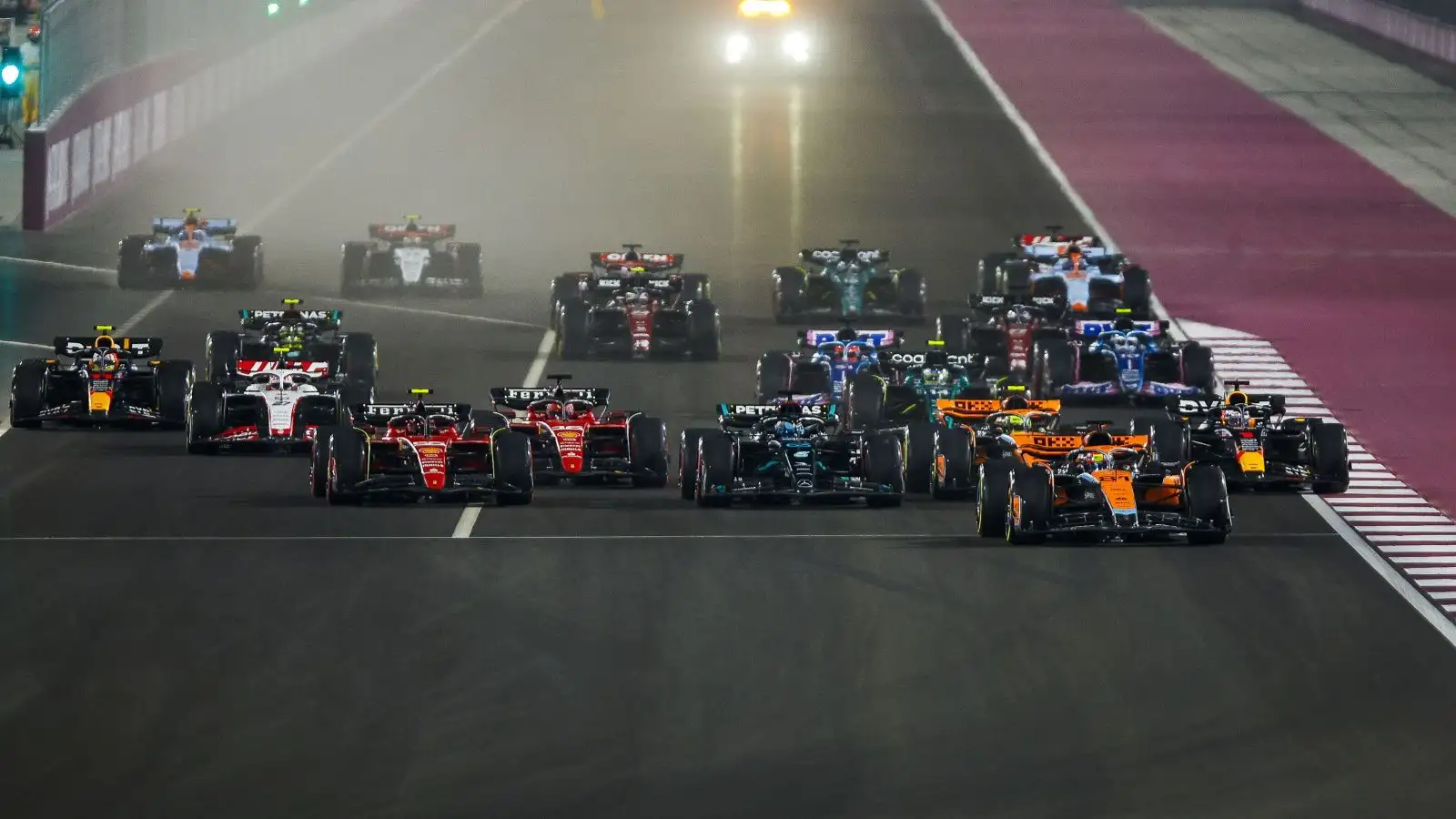 McLaren driver Oscar Piastri leads the field at the start of the Qatar Grand Prix sprint race.