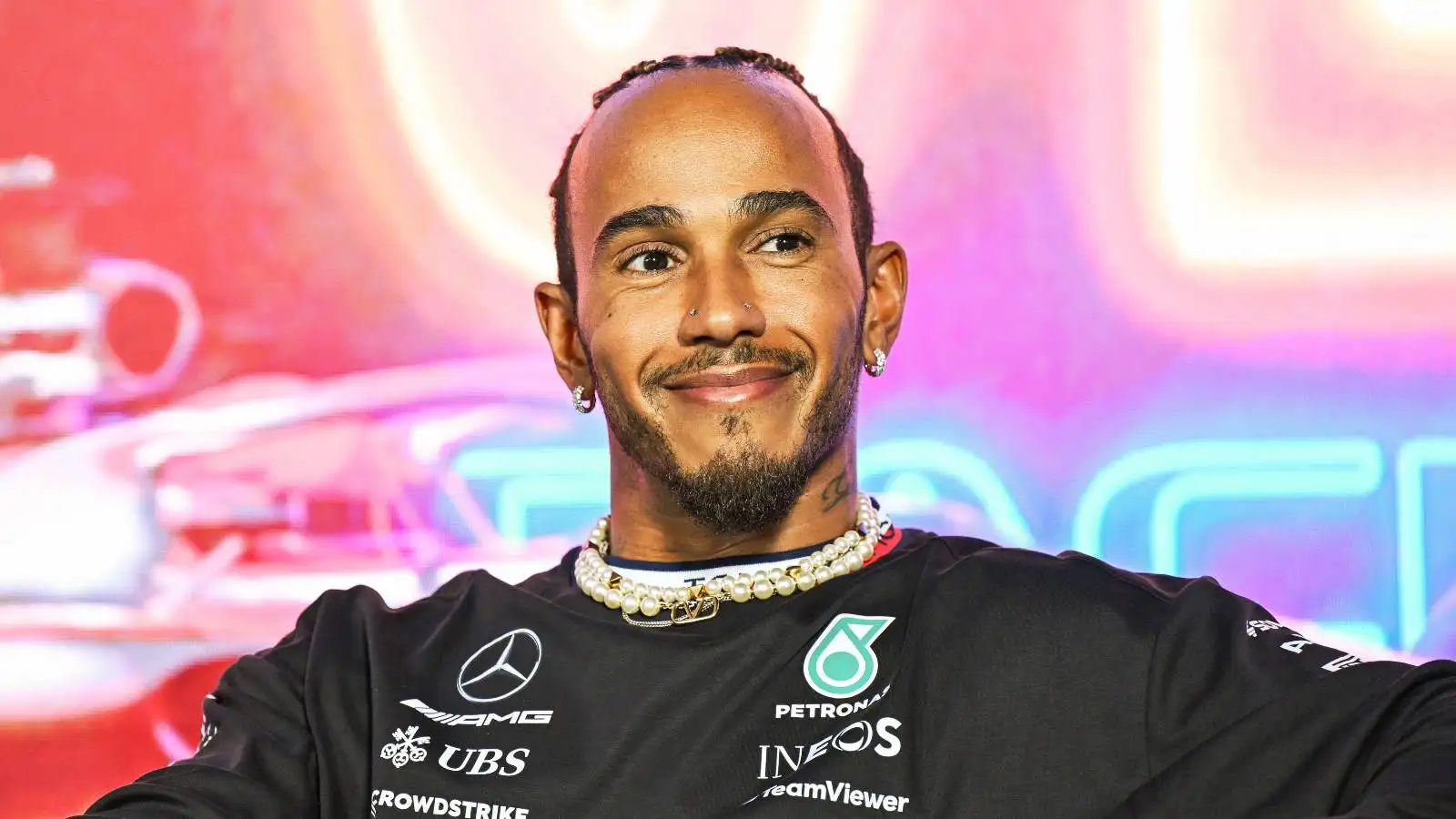 Mercedes driver Lewis Hamilton smiling as he talks to the media ahead of the Las Vegas Grand Prix.