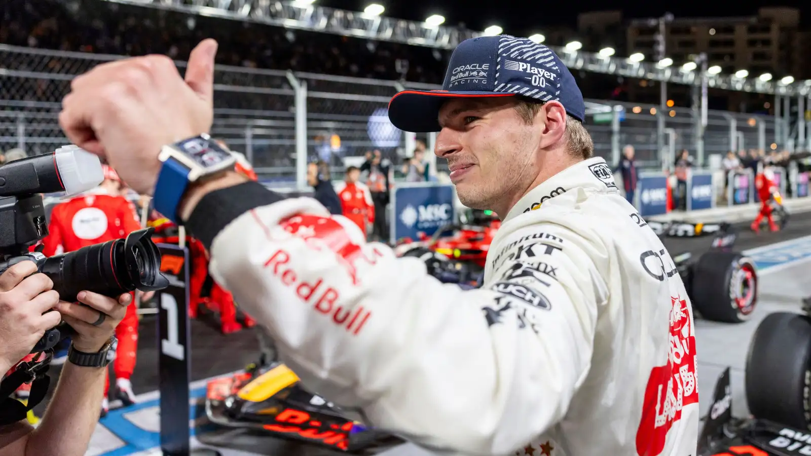 Red Bull driver Max Verstappen with a thumb up in celebration after yet another win.