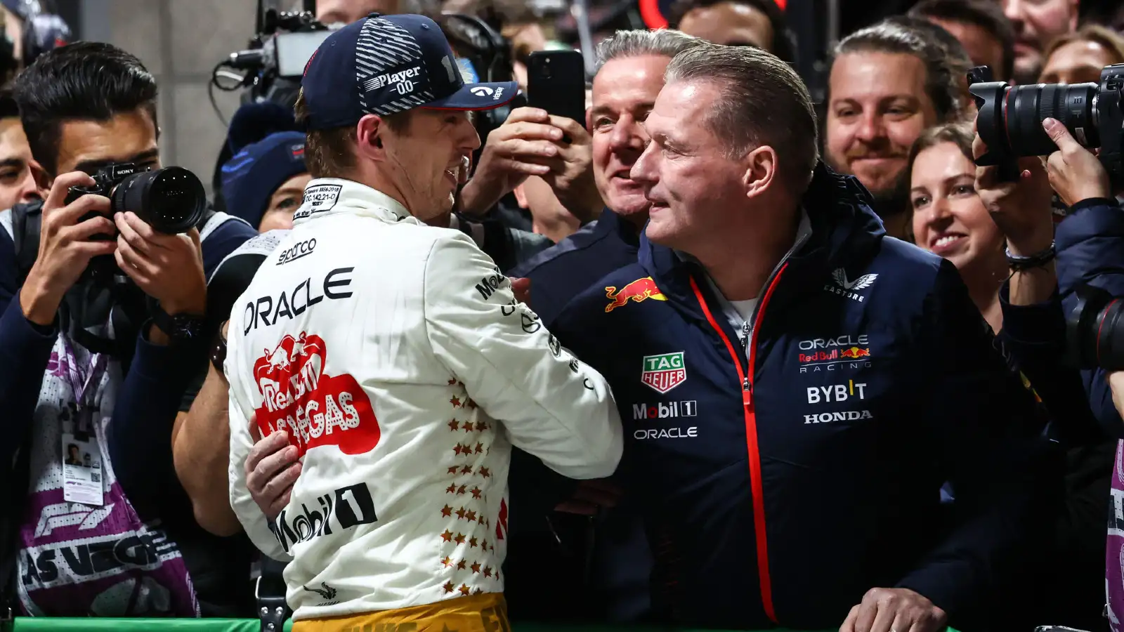 Max Verstappen greets his father Jos after victory in the Las Vegas Grand Prix.