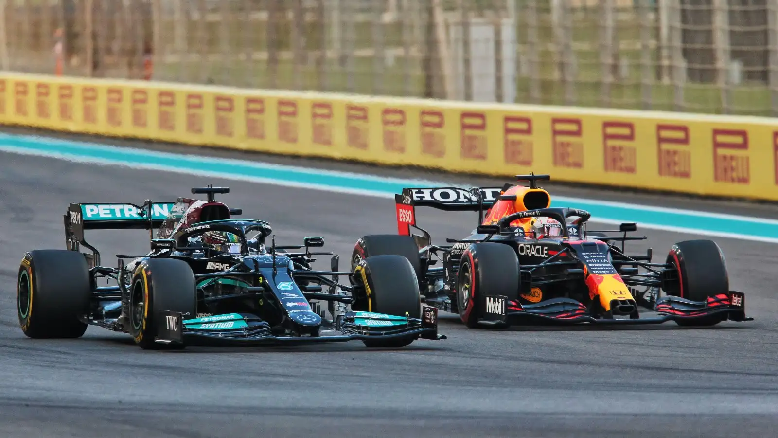 Lewis Hamilton and Max Verstappen battle for the lead.