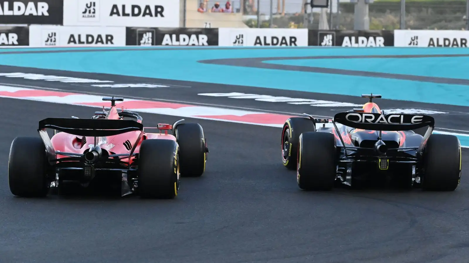 Ferrari driver Charles Leclerc challenges Max Verstappen for the lead.