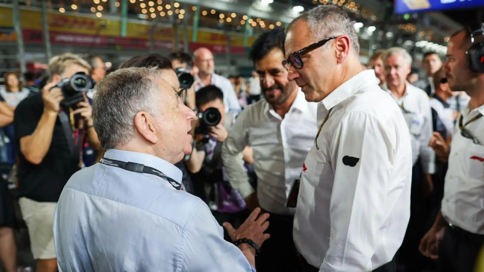 Jean Todt chats with Mohammed Ben Sulayem and Stefano Domenicali.