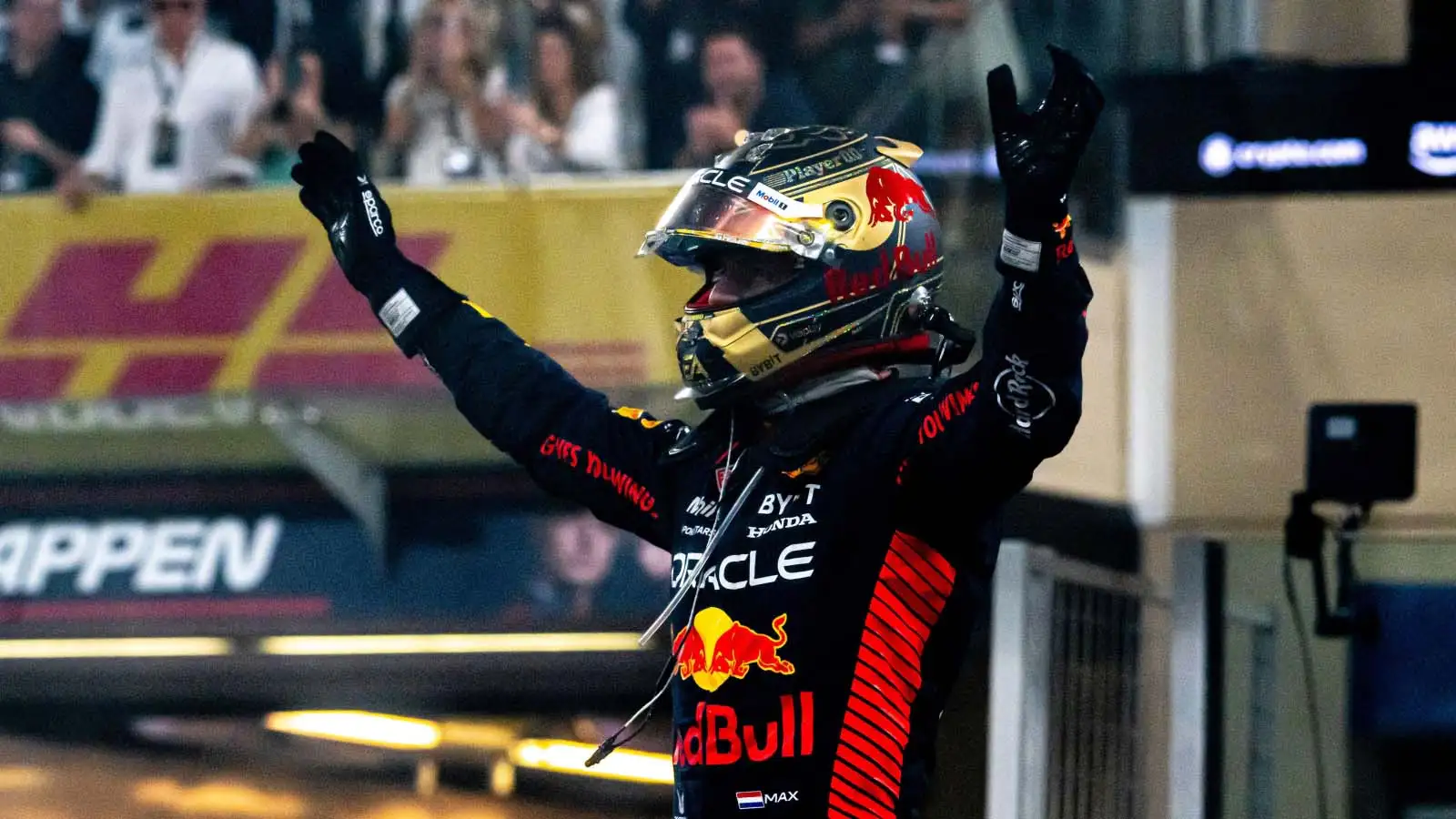 Max Verstappen raises his fists in celebration. F1 news