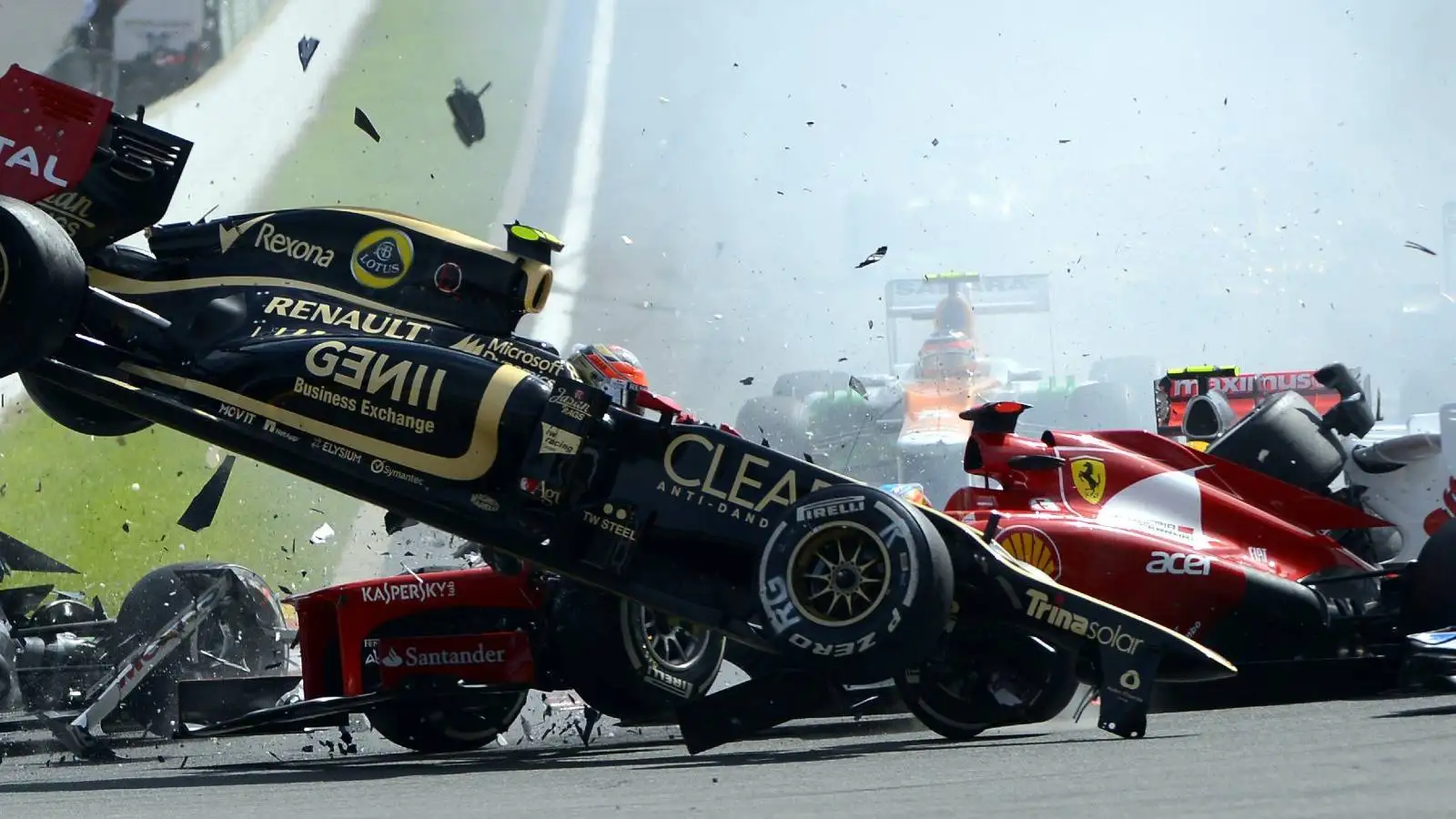 Romain Grosjean triggers a multi-car shunt at the start of the 2012 Belgian Grand Prix.