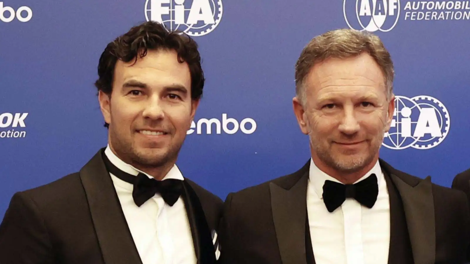 Sergio Perez with Christian Horner.