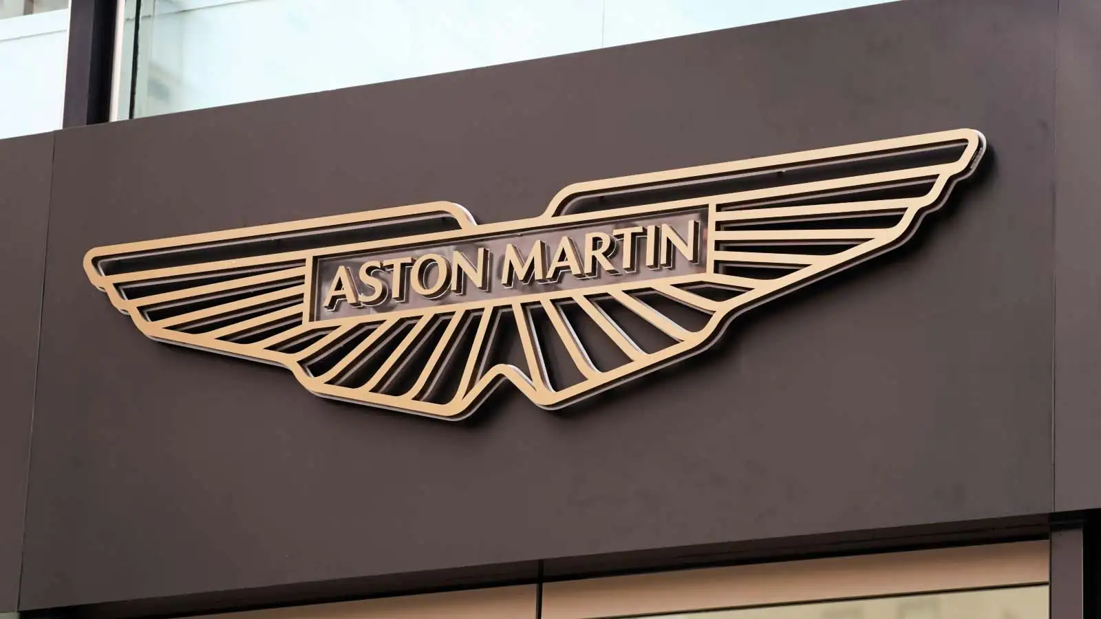 The logo of Aston Martin.