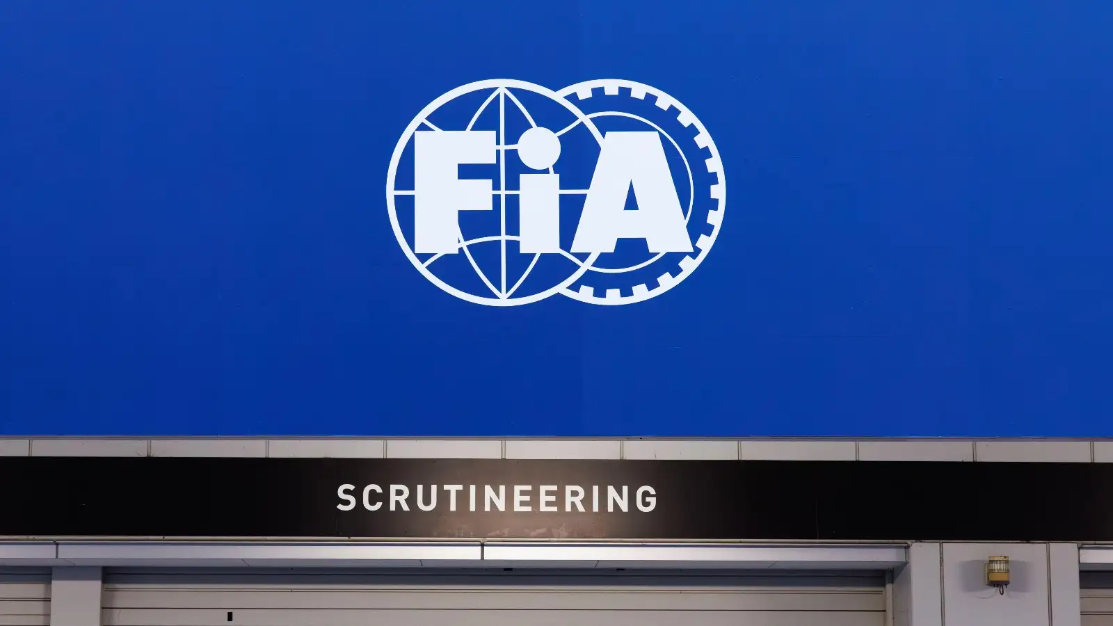The FIA logo in the paddock
