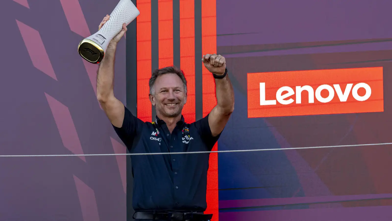 Christian Horner pictured on the podium at the Japanese Grand Prix.