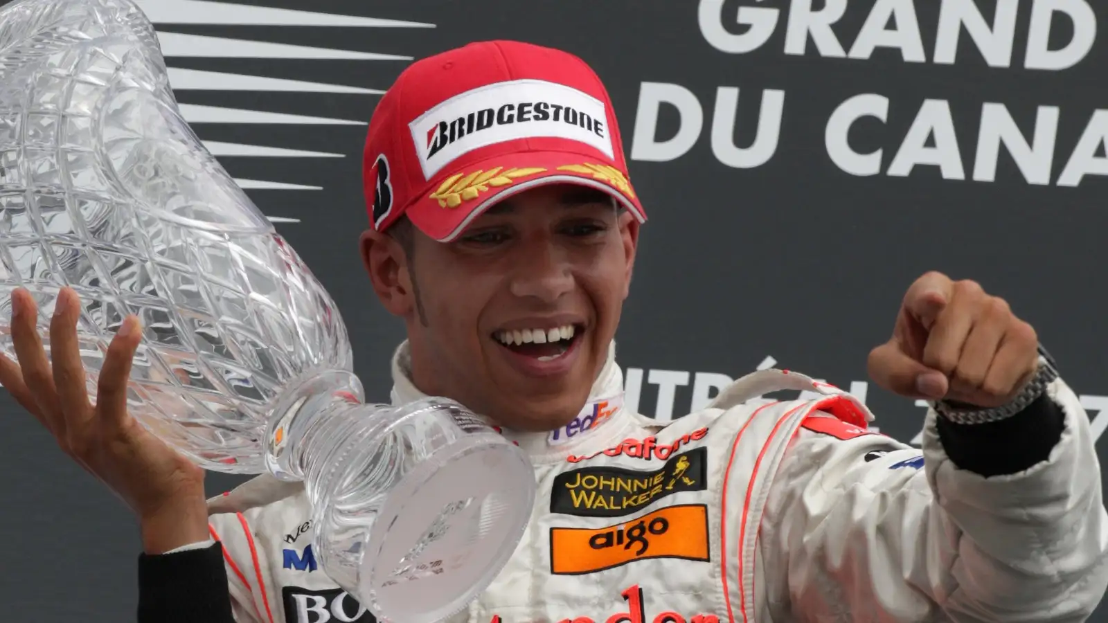 Lewis Hamilton celebrates his first F1 win.