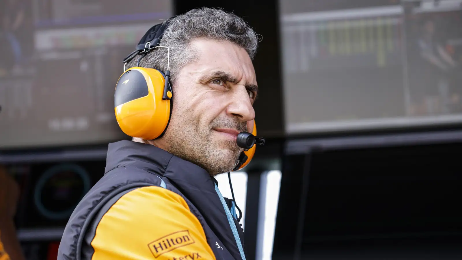 McLaren team boss Andrea Stella looks on from the pitwall at the 2023 British Grand Prix.