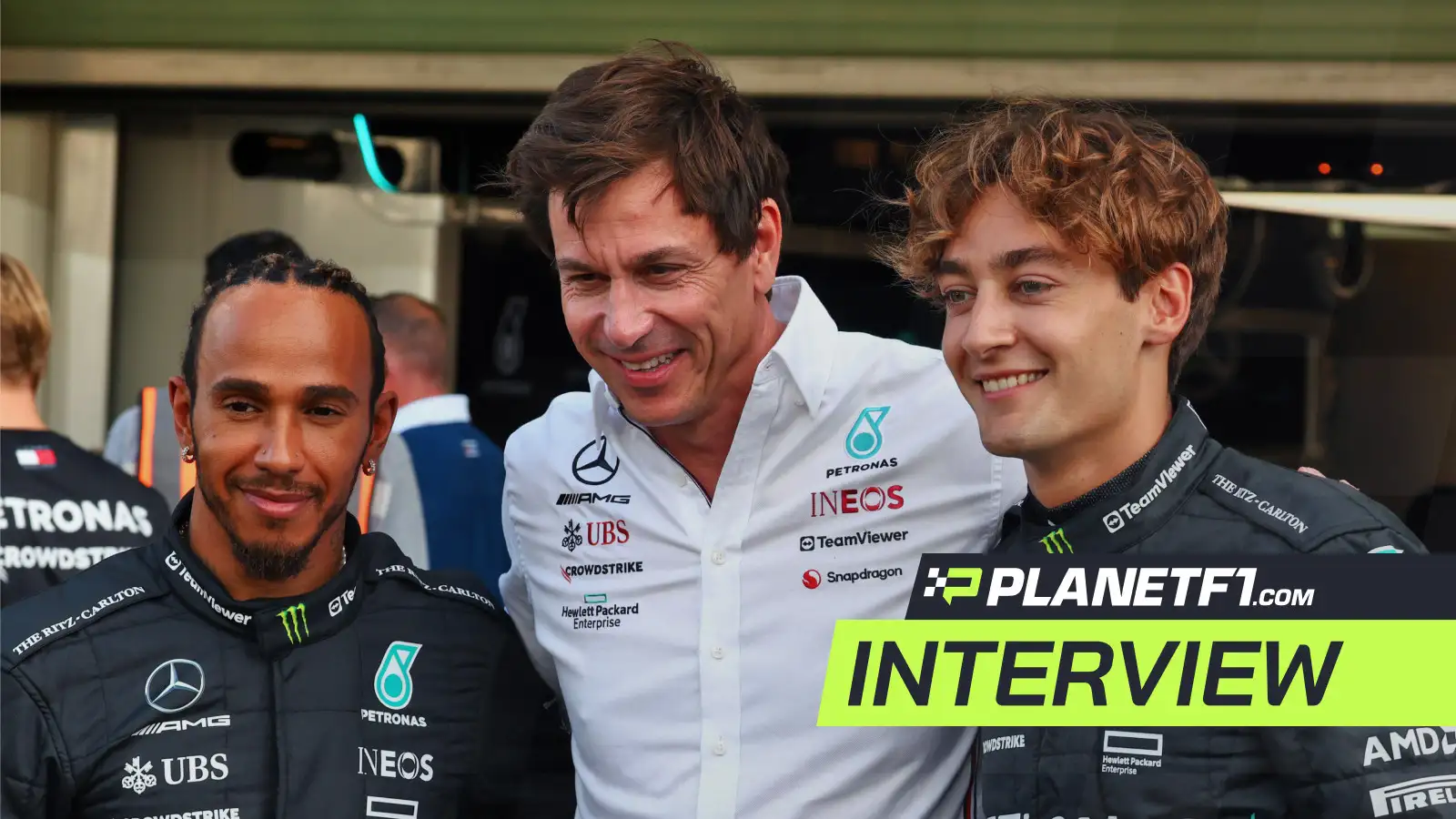 Mercedes' Toto Wolff with Lewis Hamilton and George Russell at the 2023 Abu Dhabi Grand Prix.