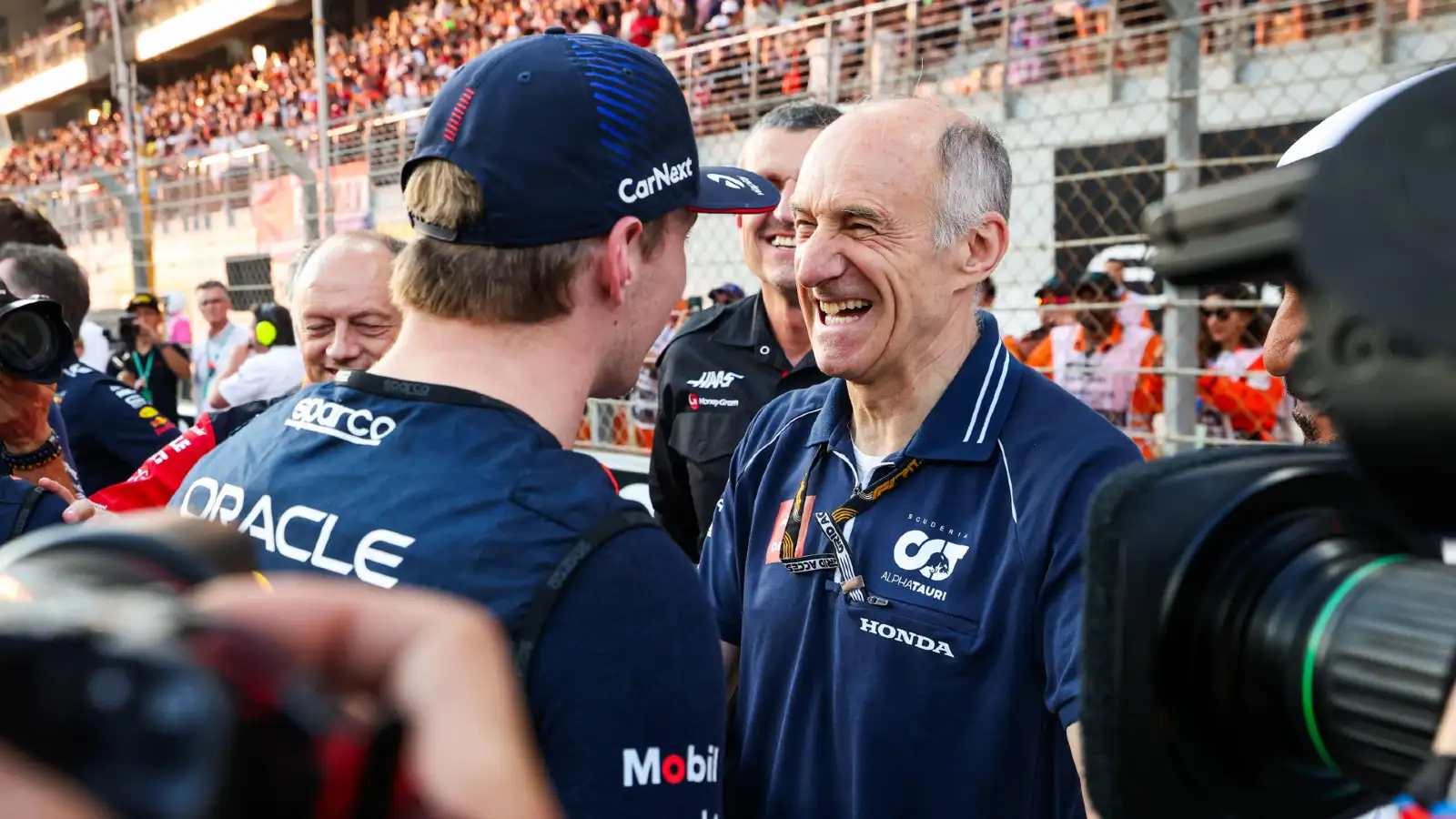 Franz Tost and Max Verstappen on the grid at the 2023 Abu Dhabi Grand Prix.
