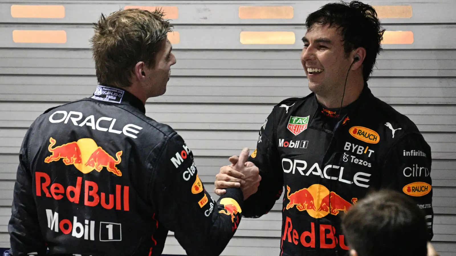 Red Bull drivers Max Verstappen and Sergio Perez at the 2022 Singapore Grand Prix.