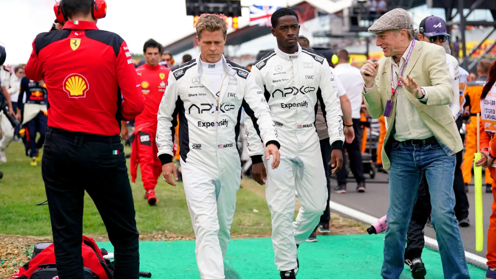 Brad Pitt and Damson Idris at the 2023 British Grand Prix.