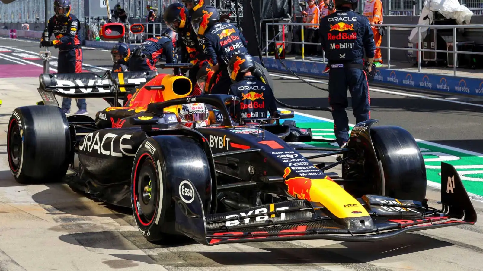 Max Verstappen leaves the Red Bull pit box.
