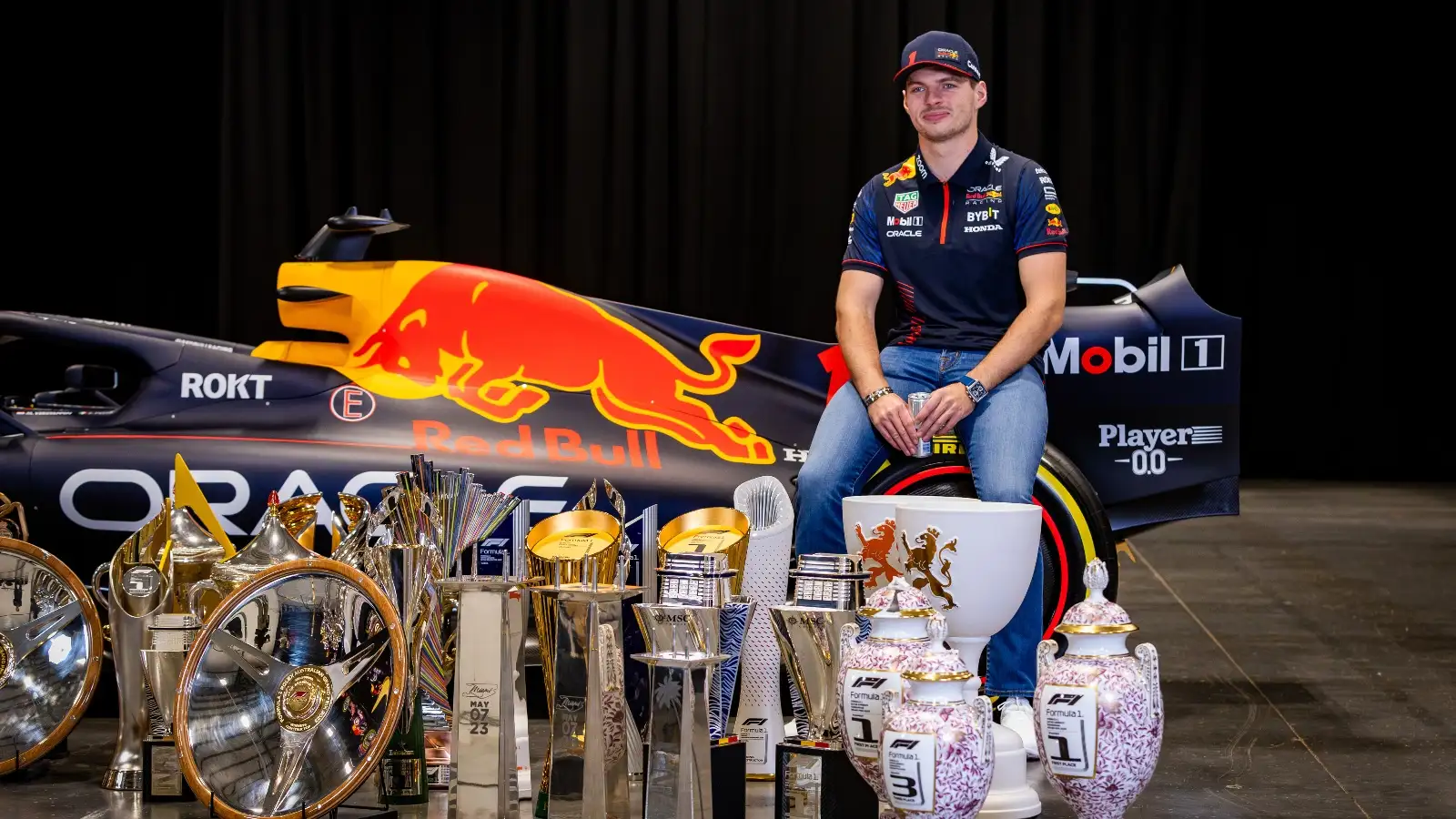 Max Verstappen with his 2023 trophies.