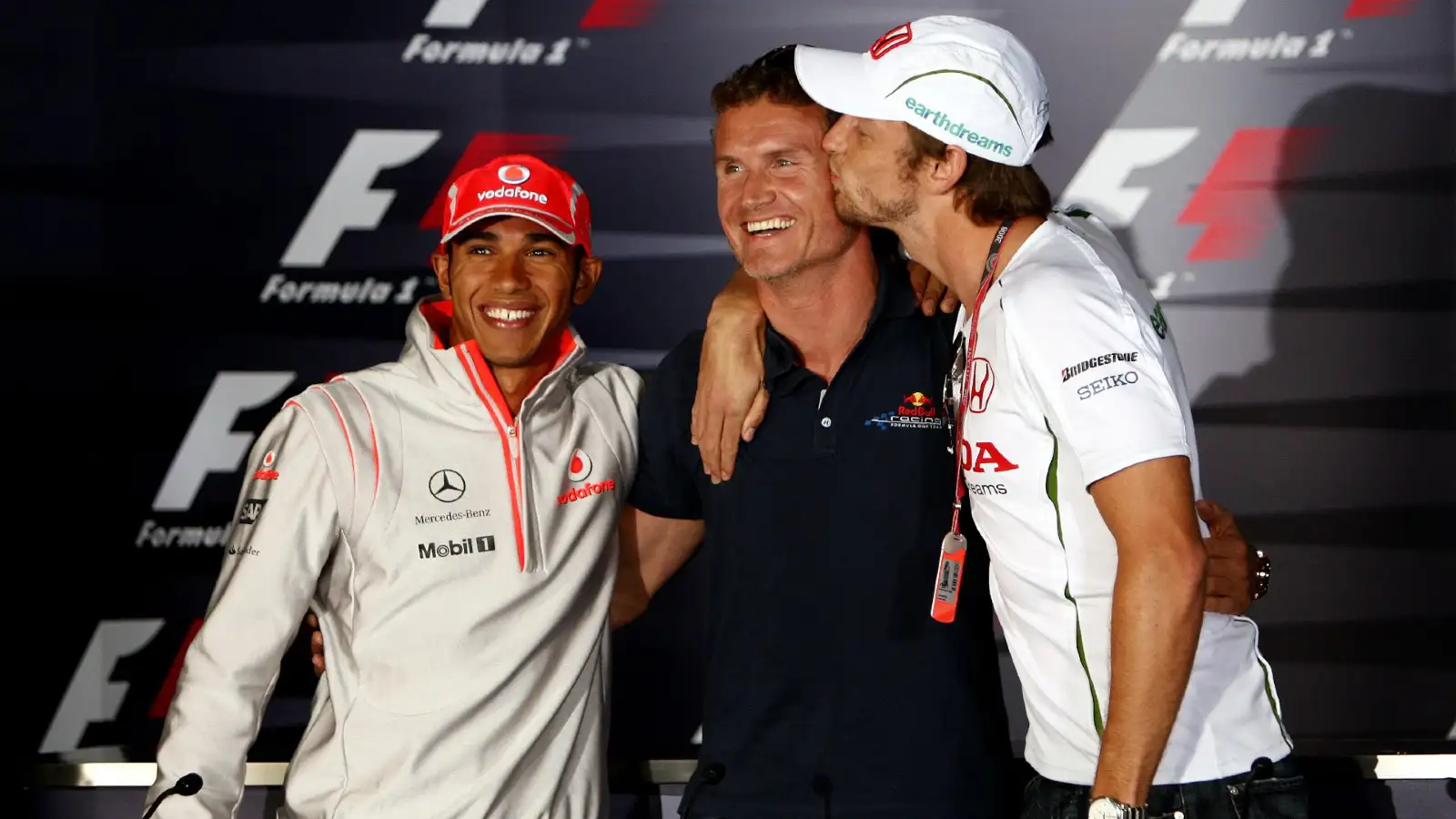 David Coulthard, Lewis Hamilton, and Jenson Button at the 2008 Brazilian Grand Prix.