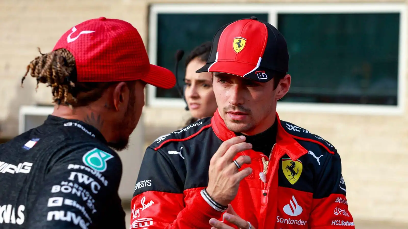 Lewis Hamilton with Charles Leclerc.