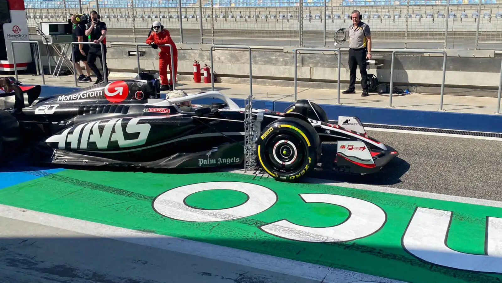 Kevin Magnussen leaves the pits in the Haas VF-24