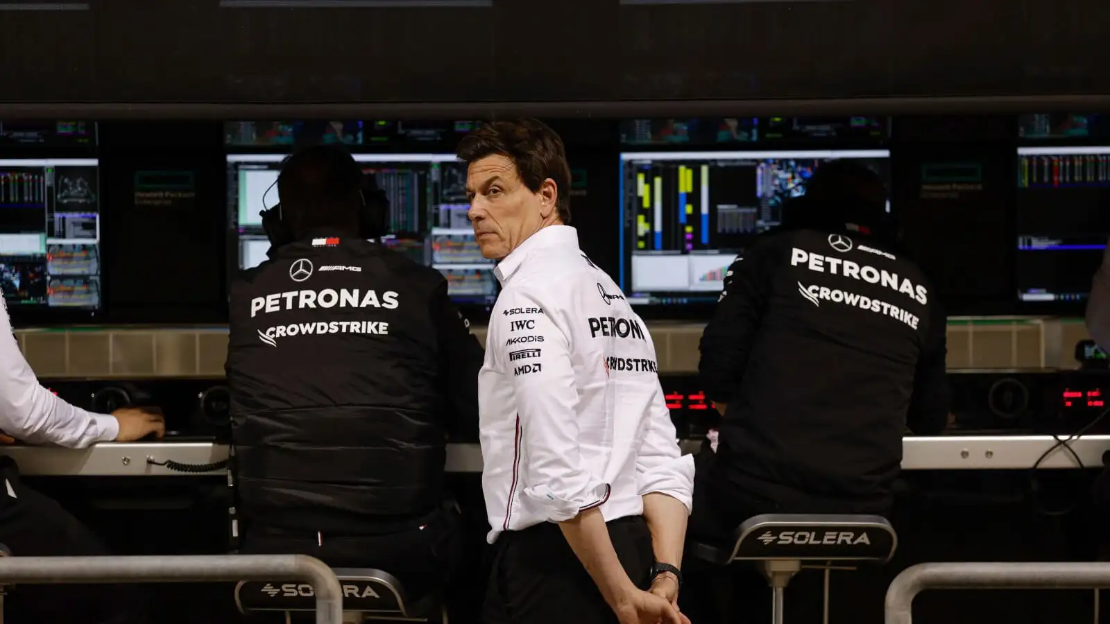 Mercedes team boss Toto Wolff with a stern look on the pit wall.