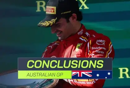 Carlos Sainz admiring his trophy after winning the Australian GP with PlanetF1.com's conclusions banner