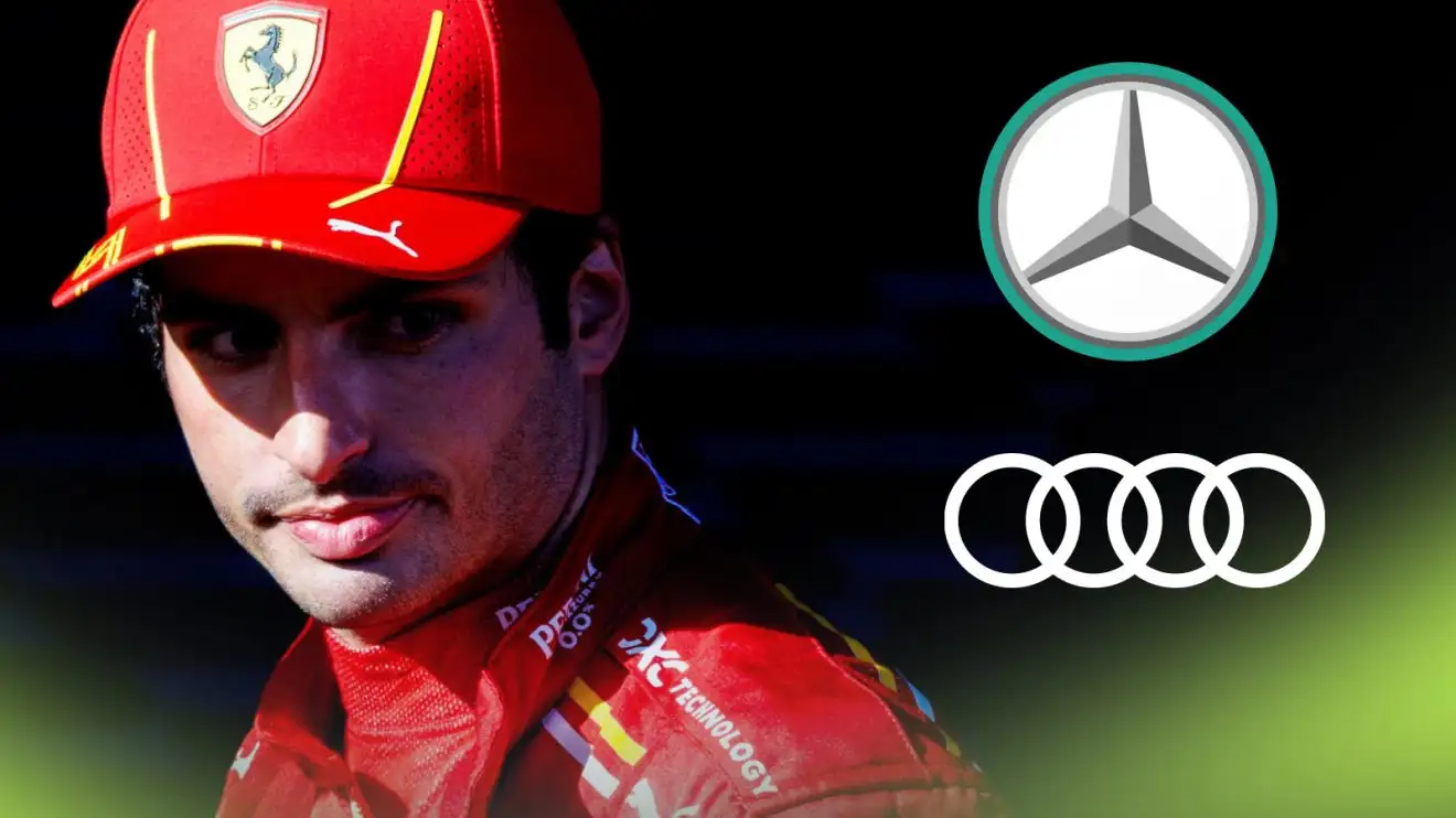 Carlos Sainz and prominent logos of Mercedes and Audi