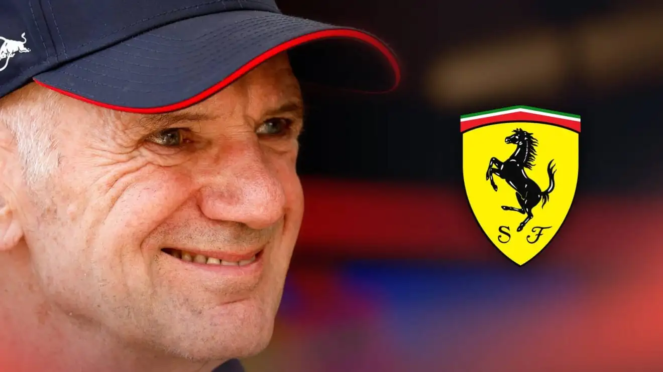 A smiling Adrian Newey with a prominent Ferrari logo alongside him