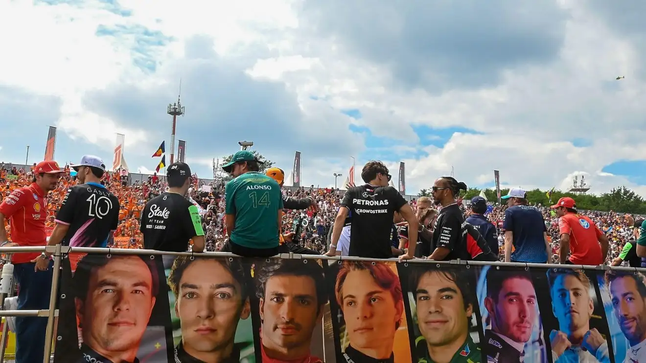 F1 drivers on a tour of the circuit.