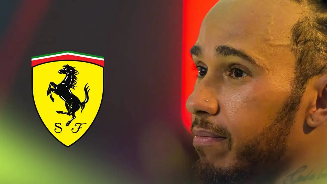 A close-up shot of Lewis Hamilton with a prominent Ferrari logo alongside him